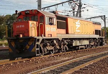 No. 34-810 in the Spoornet orange livery at Capital Park yard, Pretoria, Gauteng, 9 May 2006
